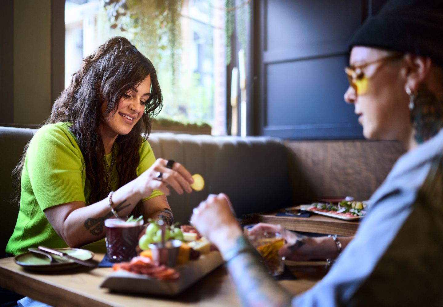 Friends sharing a meal together at a restaurant