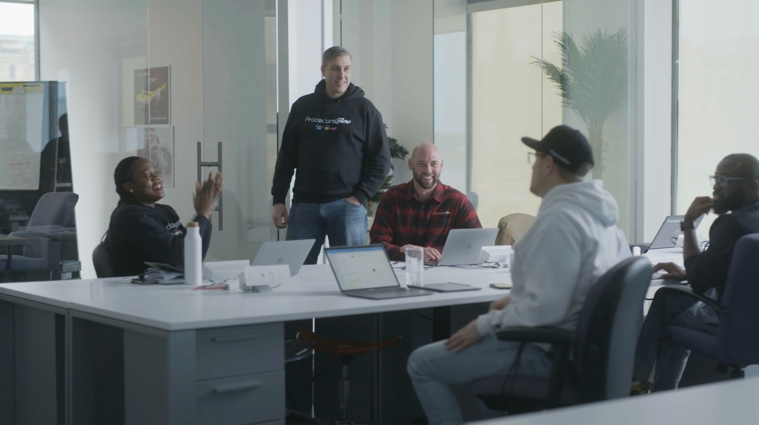 People in office smiling