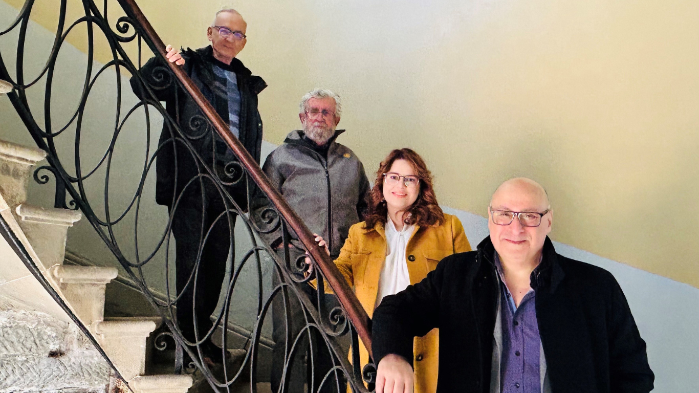 people standing on a staircase 